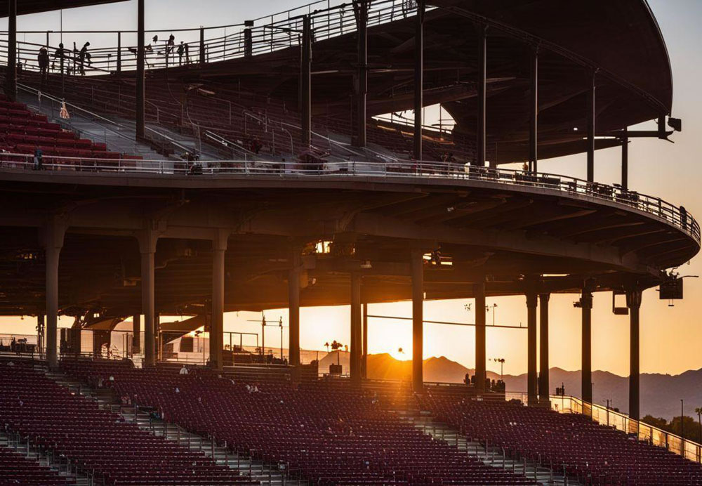 A stadium with seats and a sun setting with medium confidence